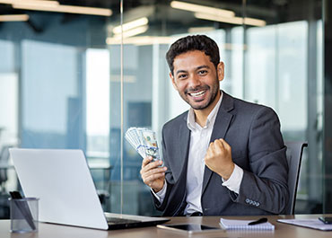 Employee celebrating successful salary negotiation—legal protections in pay discussions.